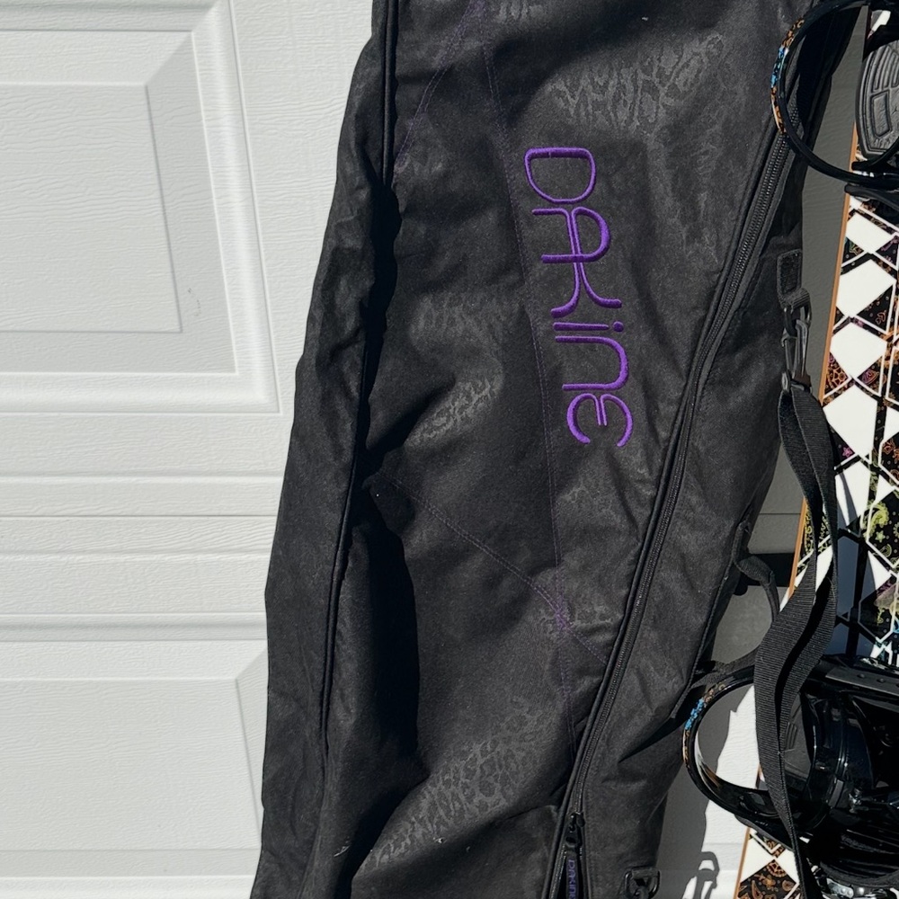 Dakine Black Snowboarding Gear Bag with Purple Accents